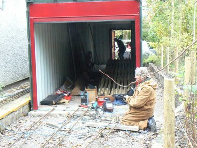 Peter Webster welding the in-going track