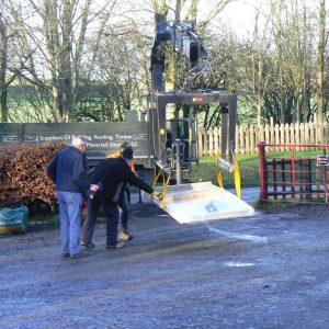 Unloading plywood for the floor